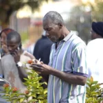 Imagen de archivo de varios inmigrantes haitianos esperando para tramitar el Estatus de Protección Temporal (TPS, en inglés
