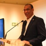 Deligne exhorta en España a la defensa del presidente y a la obra de gobierno