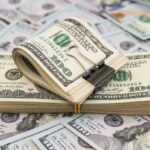 La compra de dólar descendió por debajo de RD$60 por uno