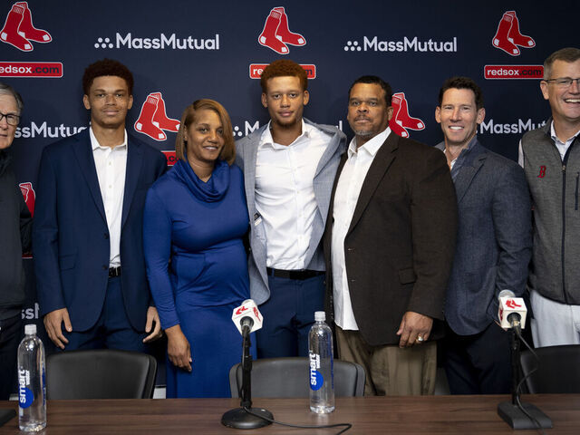 Campbell, su familia y los directivos de Boston.