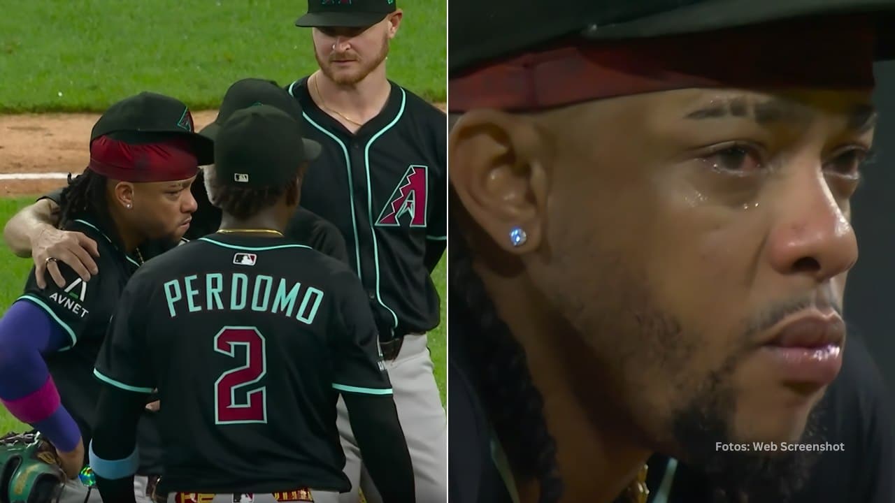 Kete Marte es consolado por su manager Torey Lovullo y compañeros.