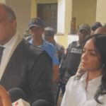 Abogado Miguel Valerio, junto a su representada, ministra de Interior y Policía, Faride Raful