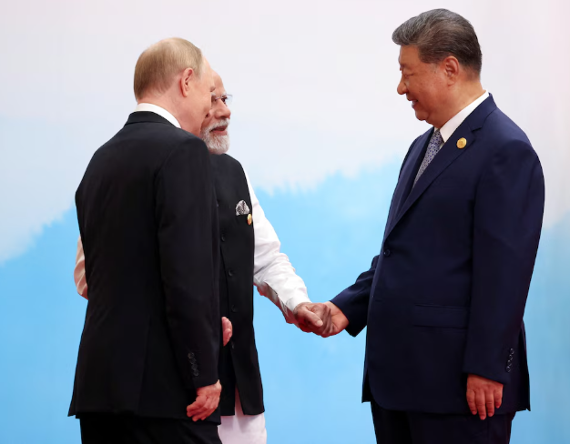 Putin y primer ministro de la india.