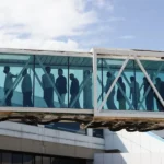 Migrantes del programa gubernamental Gran Misión Vuelta a la Patria llegando en un avión proveniente de Estados Unidos, al Aeropuerto Internacional de Maiquetía (Venezuela). EFE