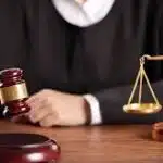 Envían a prisión a hombre y mujer por estafar más de RD$124 millones