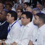 David Collado acompañado de los principales funcionarios y dirigentes del PRM. (Fuente externa).