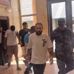Aplazan coerción contra tres colombianos acusados de robo en Santiago